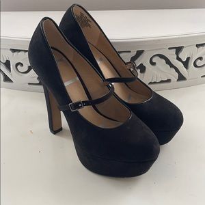 Black suede pumps